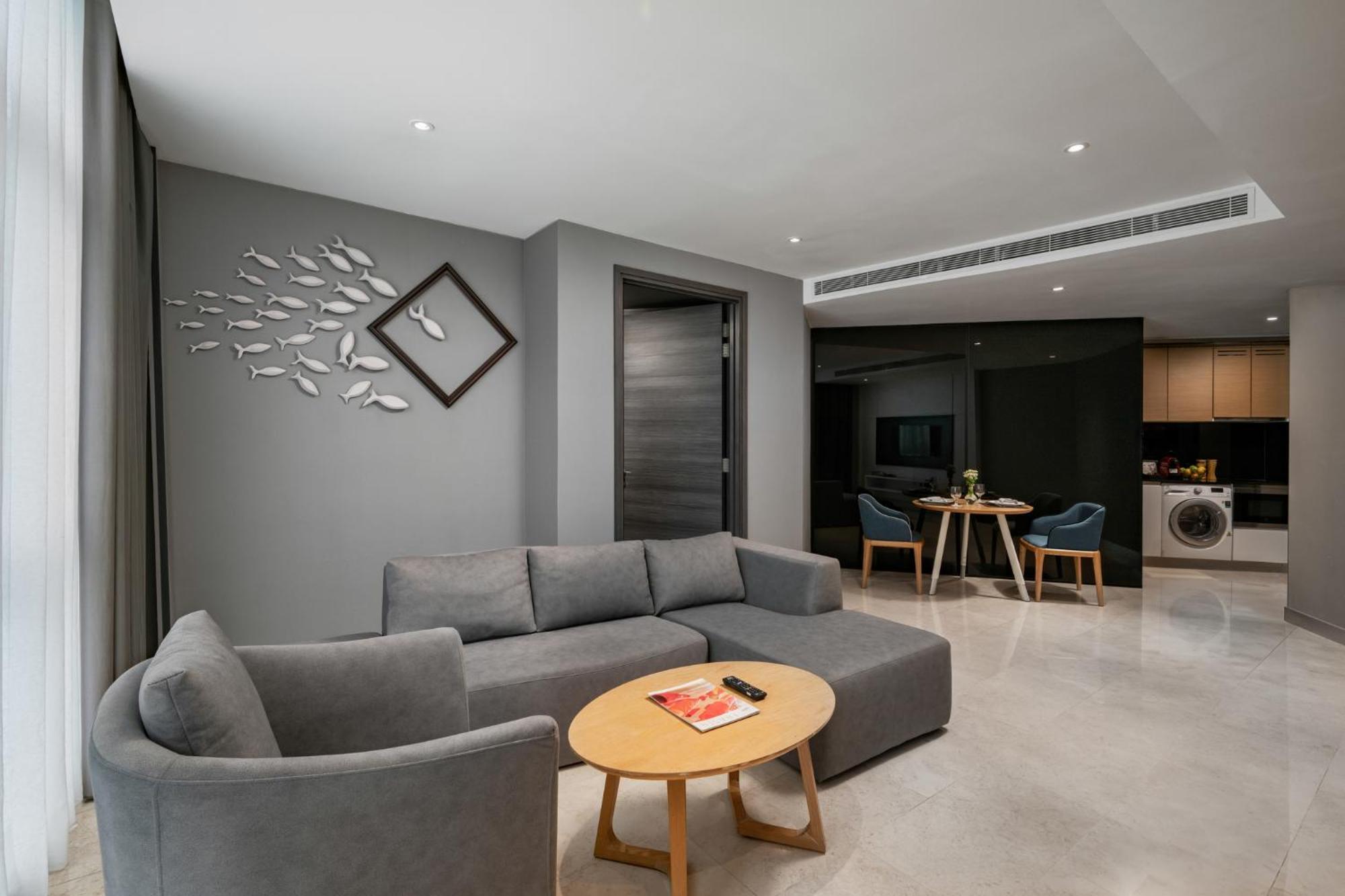 Fraser Place Puteri Harbour Nusajaya  Exterior foto A living room in a serviced apartment in Singapore